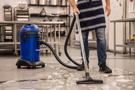 guy vacuuming with hydropro 36 wet & dry vacuum