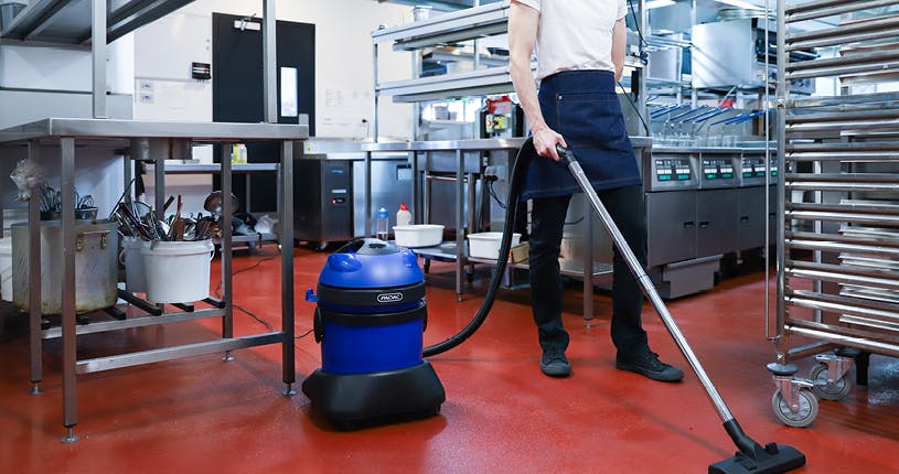 guy vacuuming with hydropro 21 wet & dry vacuum
